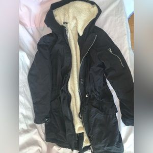 Black winter jacket with fleece lining. Very thick and just like new.